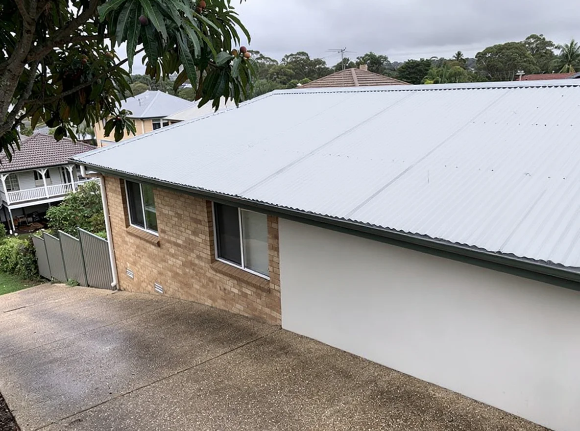 The same Bardon Colorbond roof after soft washing, clean panels with original colour restored